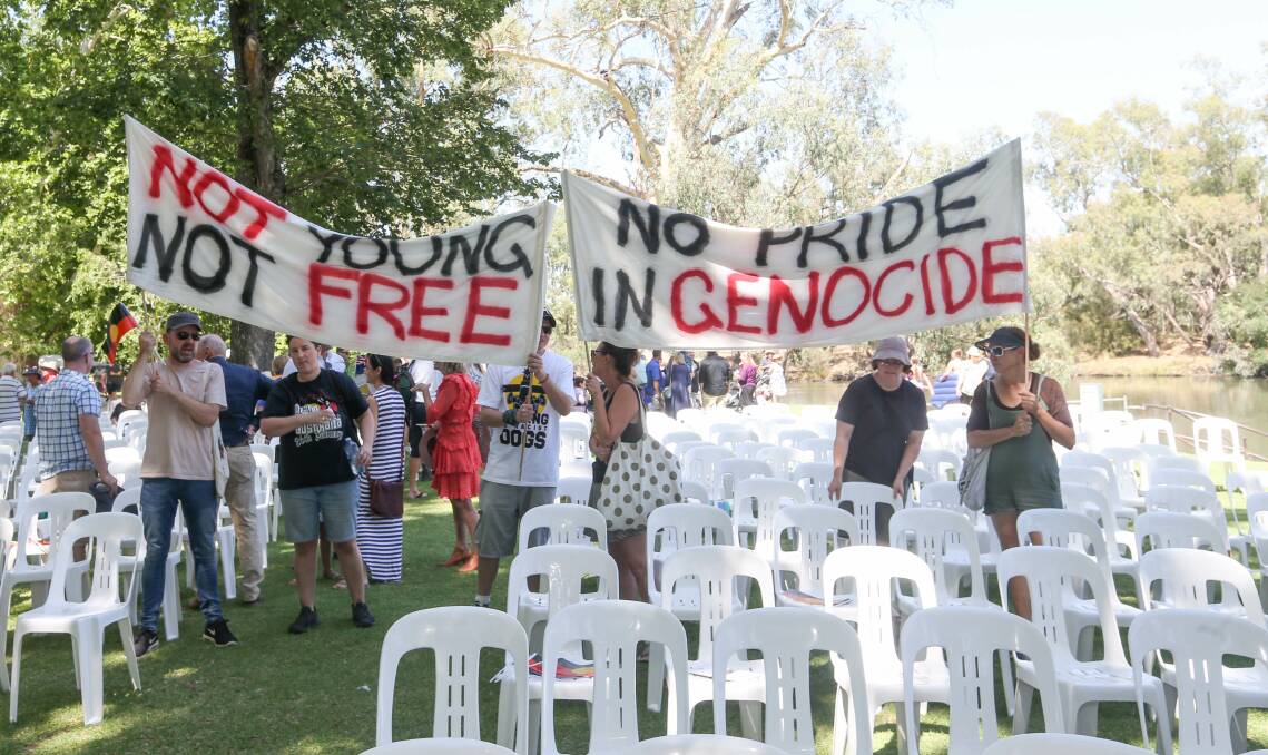 PROTEST: A small rally was held by the Murray River after last year's Albury Australia Day service, but this year's event has been cancelled. Picture: TARA TREWHELLA