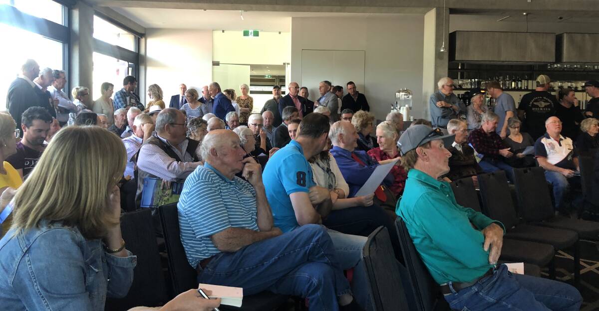 More than 150 people packed into Huon Hill Wodonga for the auction.