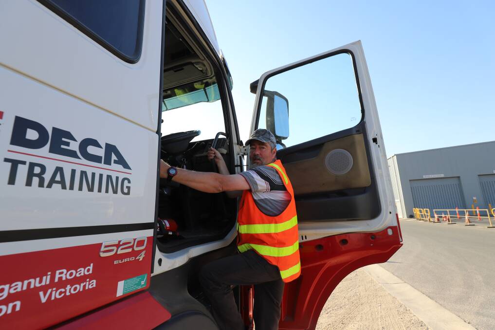 BIG DRIVE: Wodonga TAFE transport teacher Alex Stojanovic before his drive to northern NSW with a truckload of hay and feed for fire-affected farmers. Picture: WODONGA TAFE