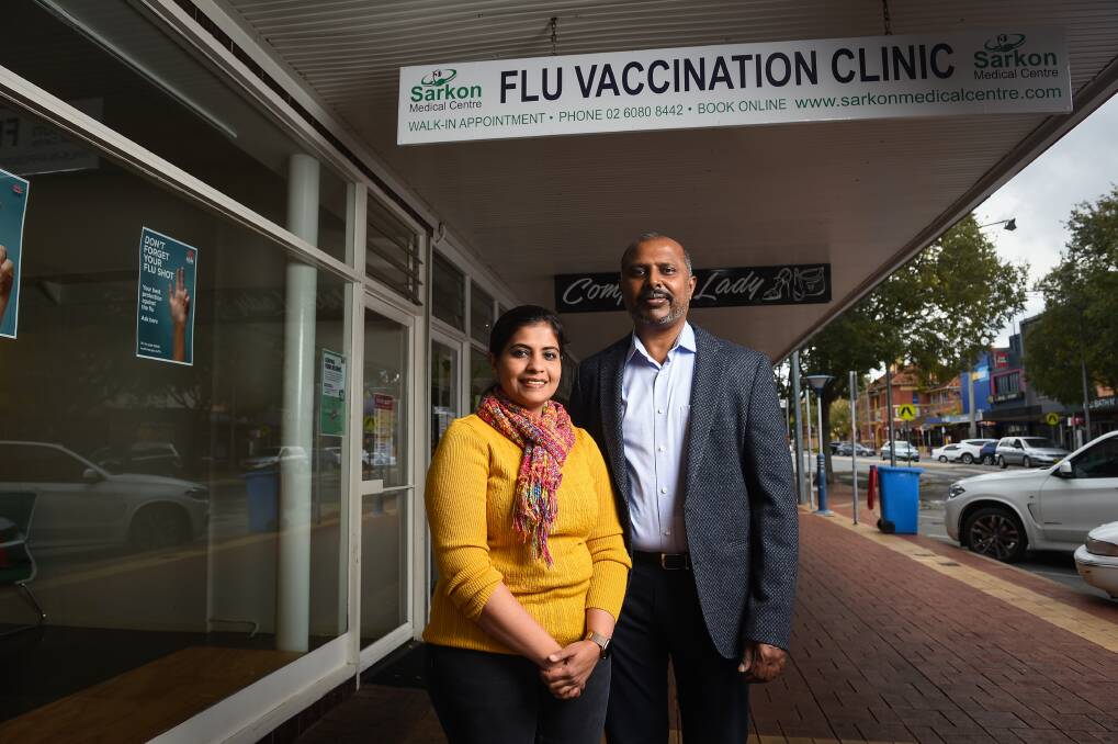 FLU SHOT: Doctors Priya Kondappan and Niranjan Sarjapuram at the Sarkon Medical Centre flu clinic on Dean Street. Picture: MARK JESSER