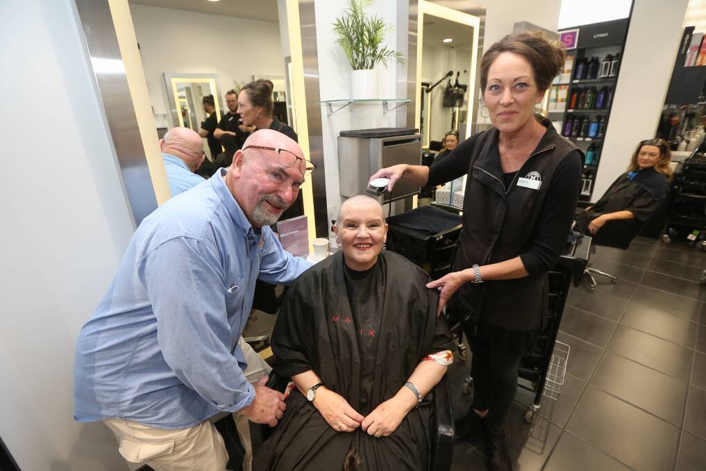 SUPPORT: Cancer patient Vicki Bibby, pictured with husband Rob, had her head shaved by Hairhouse Albury hairdresser Michelle Eames. Picture: JAMES WILTSHIRE