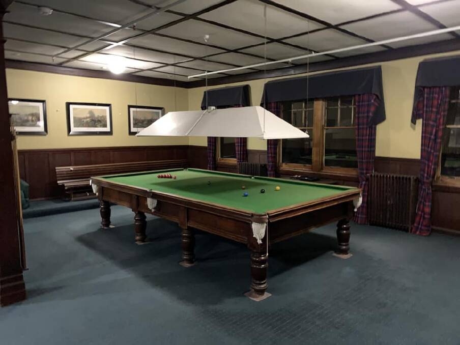 INSIDE: The old pool table still stands in the chalet.