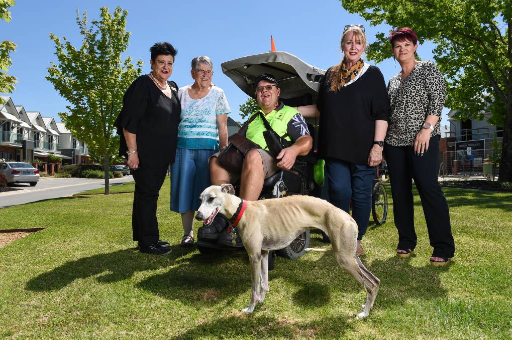 BEST FRIENDS: Chris Parnaby and his new dog Susie with Narelle Robinson, Judy Parnaby, Jen Johnson and Janet Hosie. Picture: MARK JESSER