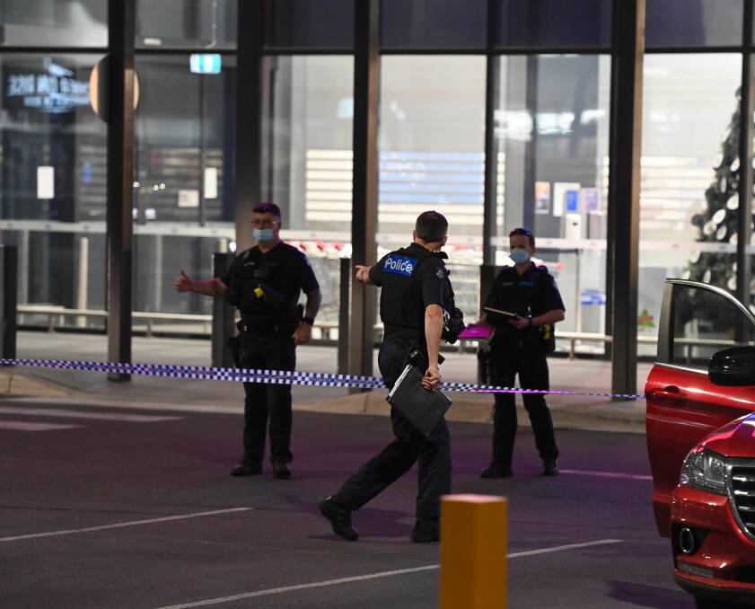 CRIME SCENE: Police cordoned off the car park near Kmart in Wodonga after reports of a gun shot. Picture: MARK JESSER