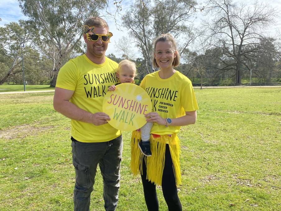 VIRTUAL WALK: Sunshine Walk ambassadors Matt and Jorja Langbine, with 15-month-old son Tex, are encouraging the Border to sign up to the November 22 event.