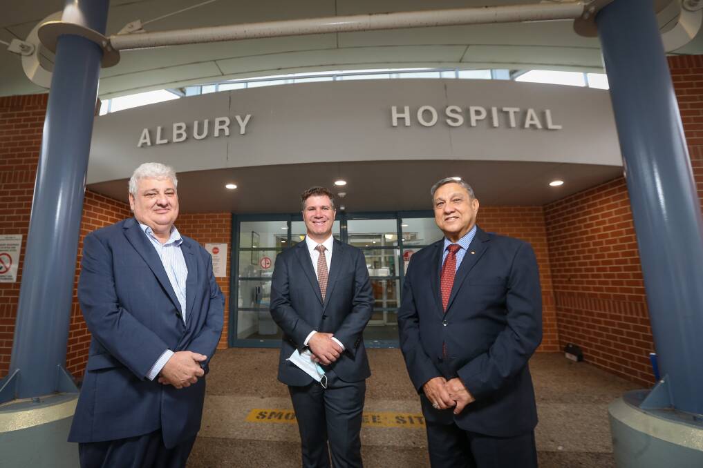 NEXT STEP: Albury Wodonga Health chief executive Michael Kalimnios, Albury MP Justin Clancy and AWH chairman Matt Burke have welcomed the masterplan funding. Picture: JAMES WILTSHIRE