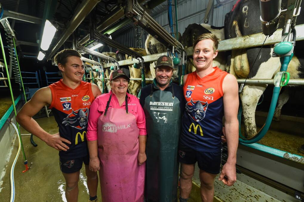 FAMILY: Cooper, Meaghan, Noel and Alex Daly in their Jingellic dairy prior to a Mother's Day O&M football match last year.