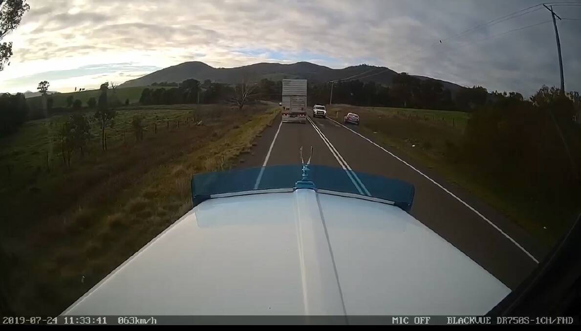 CAUGHT ON CAMERA: The moment a Sureway employee attempts to overtake two trucks near Tallangatta and narrowly misses oncoming traffic which was caught on dash cam footage.