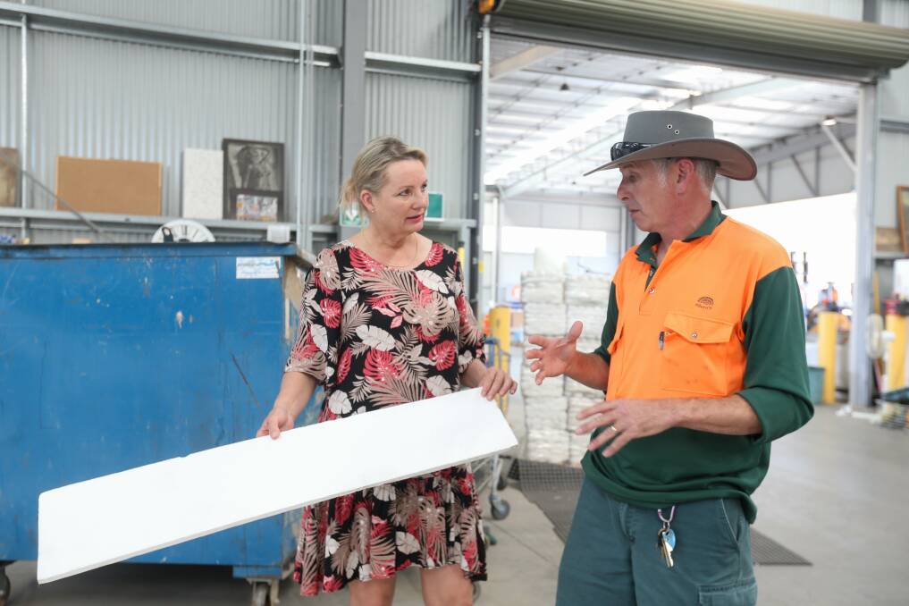 MORE TO BE DONE: Environment Minister Sussan Ley gets a run down of what is recycled locally from Albury Recycling Centre's Greg Billington. Picture: TARA TREWHELLA