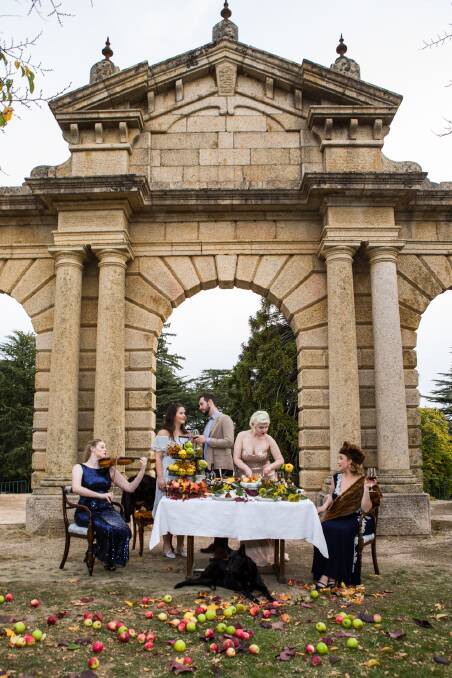 Opera Scholars Australia performers Miriam Whiting Reilly, Saffrey Brown, Ben Colley, Jessica Cleave and Chloe Harris tuck into an autumn feast at Beechworths old hospital faade above Beechworth Gorge. Picture: MARC BONGERS