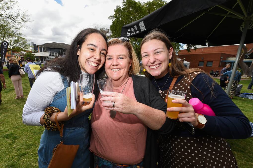 SOCIAL: Mercy Eze, Rebecca Honeyman and Rachel Habermann of Albury were just three of more than 2000 at the event. 