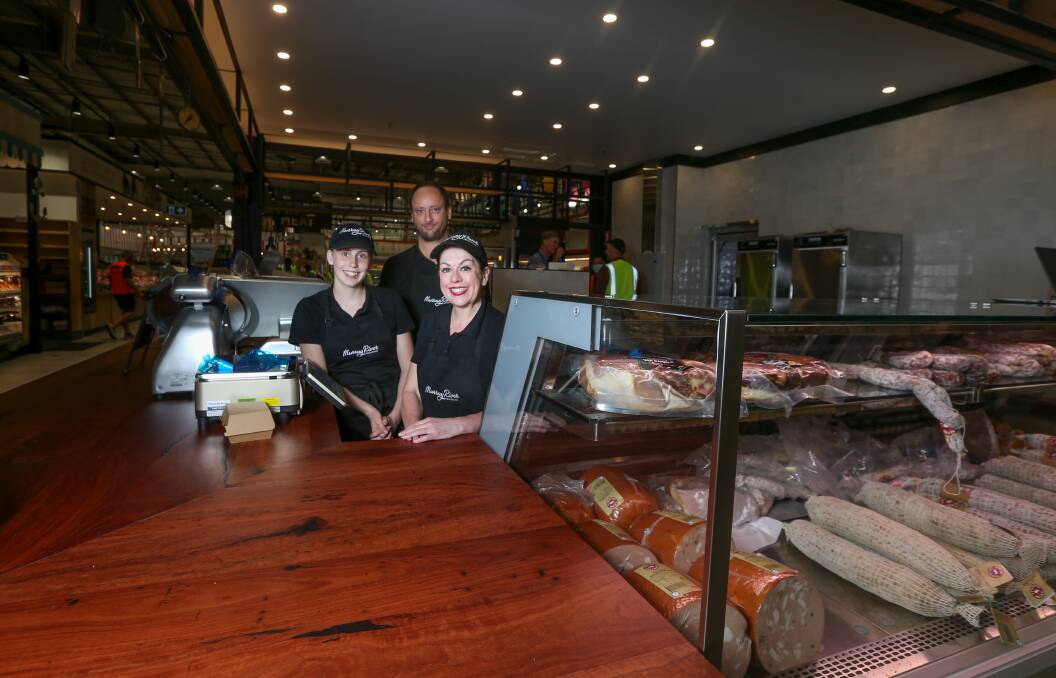 SETTING UP: Murray River Smokehouse shop assistant Yasmin Linssen, assistant manager Peter Hill and manager Rebecca Rahaley.
