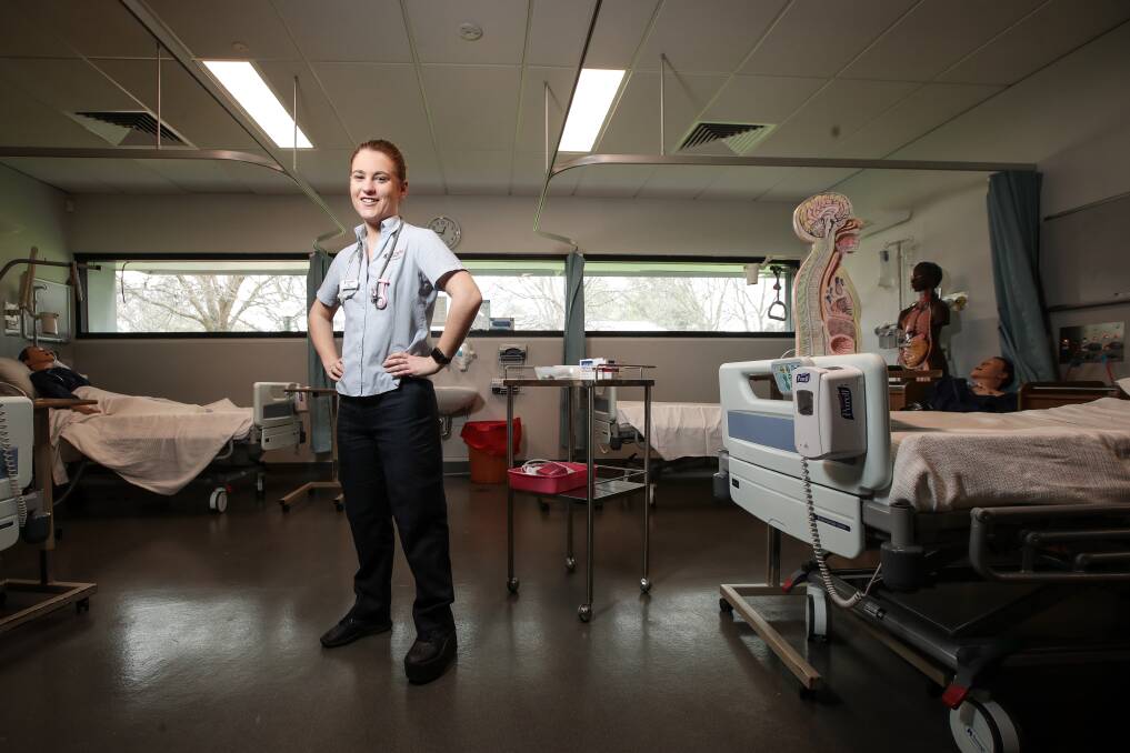 DETERMINED: Student nurse Erin O'Brien was born with one leg shorter than the other and has so far had 17 surgeries to help lengthen the leg and fix ongoing hip and knee problems. Picture: JAMES WILTSHIRE