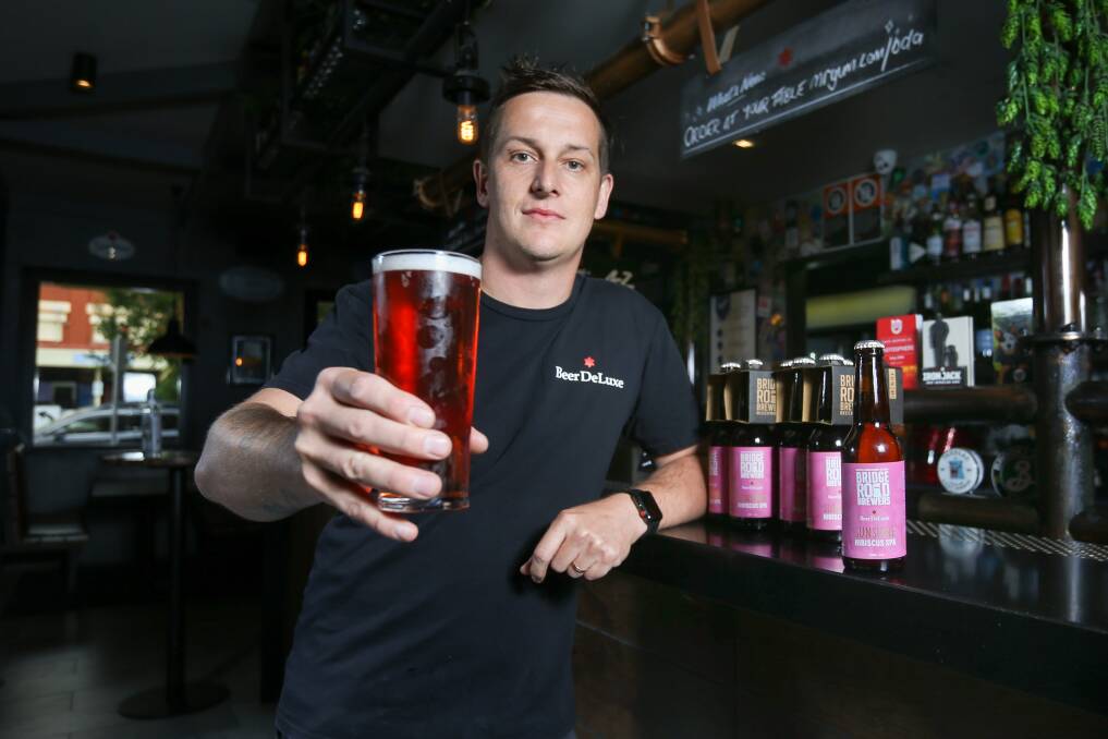 CHEERS: Beer Deluxe Albury venue manager Bart Furst with the 202-Bridge Road Brewers Sunshine XPA which is on tap at the pub. Pictures: TARA TREWHELLA