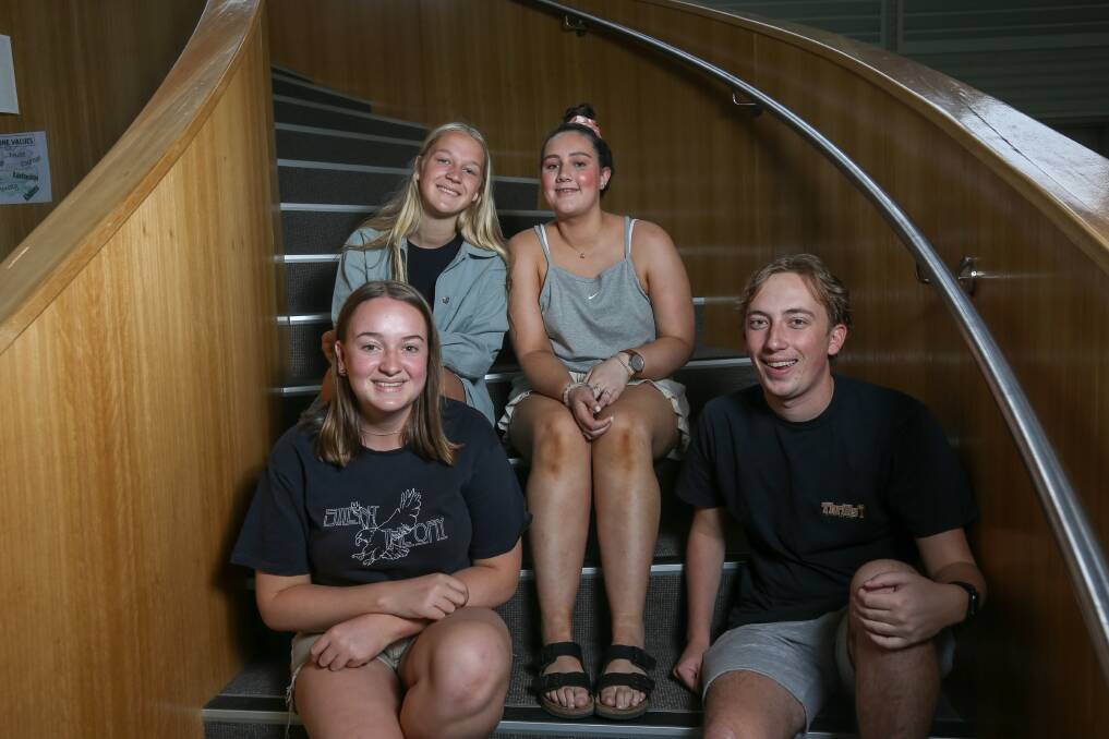 GOING OUT ON A HIGH: Catholic College Wodonga students Ella Burton, Ellie Ainsworth, Bonnie Jones and Tom Twycross gathered at school to celebrate their results with their peers. Picture: TARA TREWHELLA