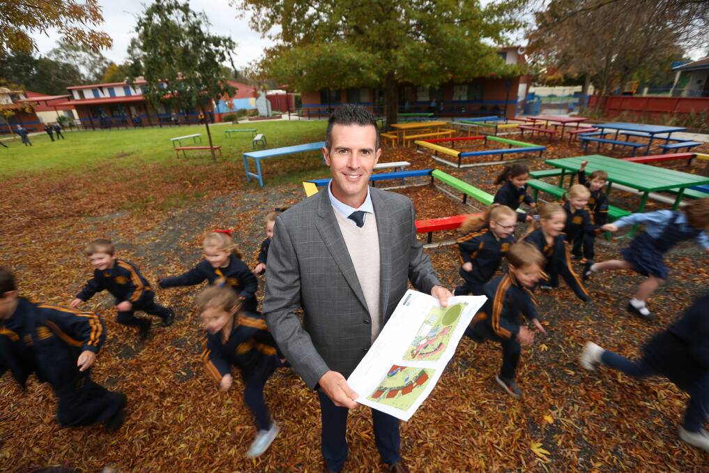 MASTERPLAN: St John's Lutheran School Jindera principal Brad Moss with plans for the school upgrades. Picture: JAMES WILTSHIRE