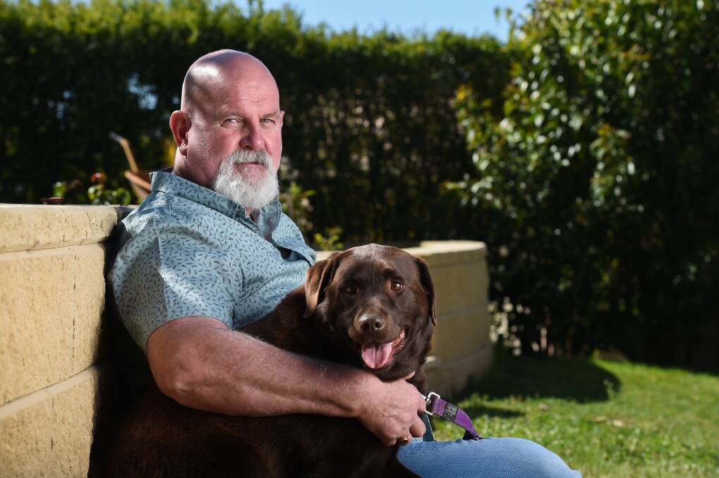 FOR KERRY: Barclay Dowling will walk 42.2 kilometres with his dog Kelsey this October to raise money and awareness for the Heart Foundation in honour of his wife Kerry. Picture: MARK JESSER
