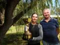 RACE DAY: Albury trainer Rob Stubbs and daughter Abby with the Albury Gold Cup which will be run in front of crowds for the first time since 2018. Picture: JAMES WILTSHIRE