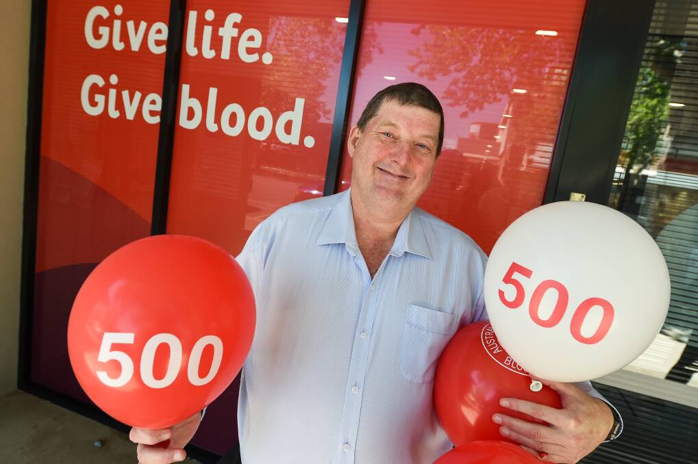 GIVE BLOOD: Andrew Pullin celebrates his 500th blood donation at the Albury Blood Donor Centre and urges everyone to pull up their sleeves and donate to save three lives. Picture: MARK JESSER