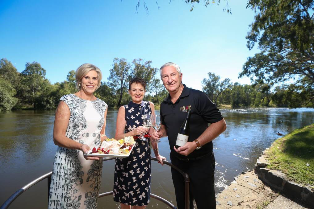 TOURISM PUSH: Albury City tourism team leader Sue Harper with Level One Wine Bar owners Deb and Mark Davis. Picture: JAMES WILTSHIRE