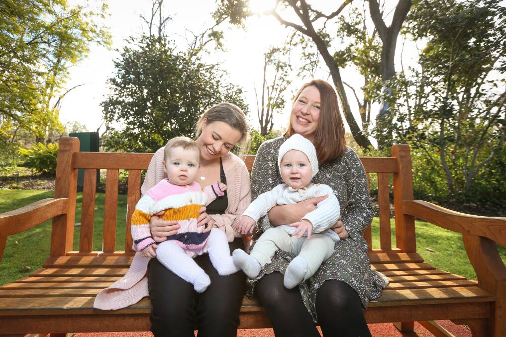 MUM'S THE WORD: Organisers Jess Plunkett with Poppy, 9 months and Brooke Whitehead with Bear, 6 months are encouraging Border mothers to attend the Big Latch On event on August 4. Picture: JAMES WILTSHIRE