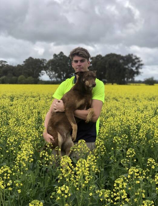 BACK HOME: James Davies and his dog Bella on his farm near Benalla who is coming back home to work for LS Precast. Picture: Remy Tonks