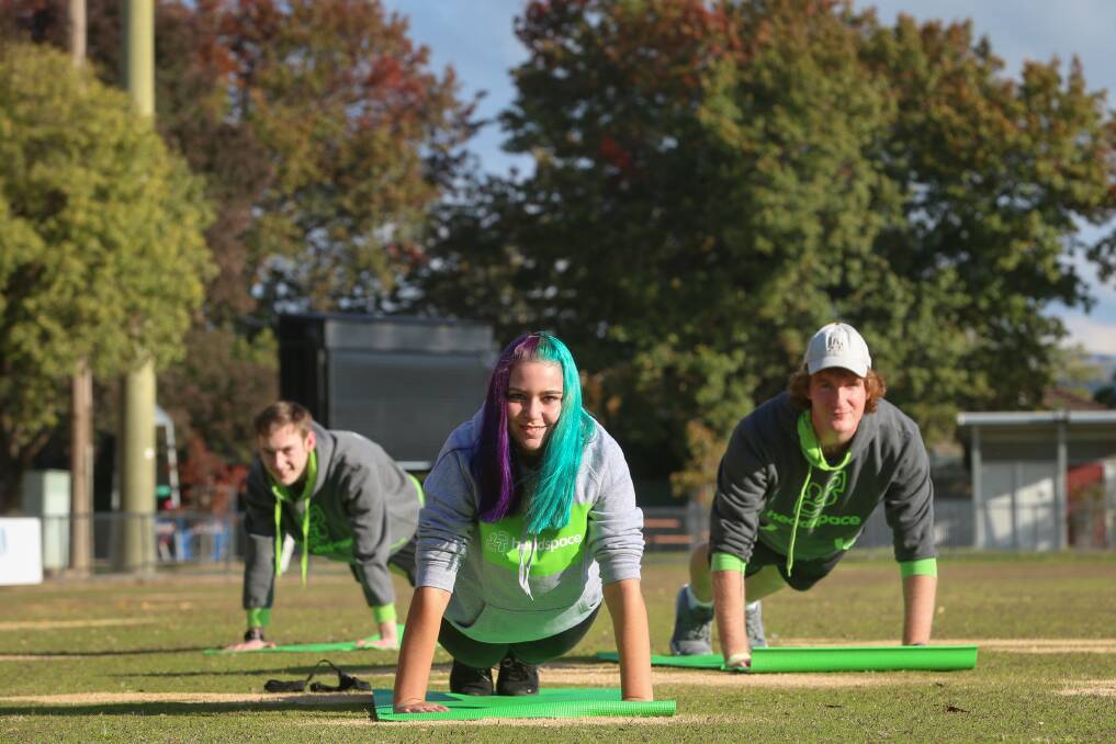 CHALLENGE: headspace youth reference group members Jordan Ross, 17, Kylie Frauenfelder, 17, and Josh Rickard are calling on the Border community to take part in The Push-Up Challenge. Picture: JAMES WILTSHIRE