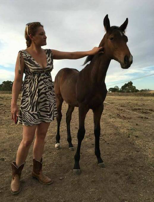 LOVE OF HORSES: Alicia Little's family is calling for a national domestic violence register which they say could have saved her life. 