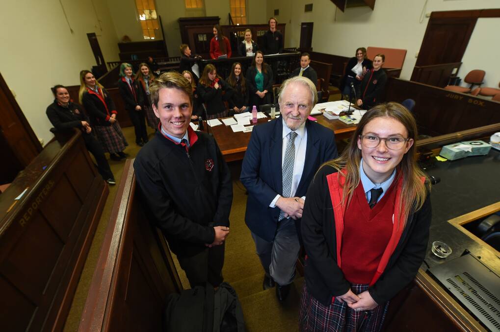 MOCK TRIAL: Don Cameron with year 11 Albury High Students Alex Kohne and Tiara Willis who took part in the mock trial on Thursday. Picture: MARK JESSER