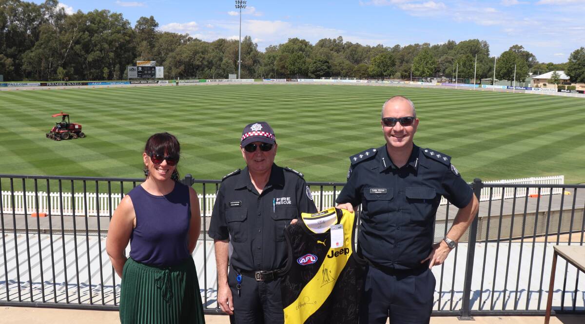 MORE THAN FOOTY: Council community wellbeing director Jaime Chubb, District 23 operation manager Colin Brown and Wangaratta Inspector Luke Kirton. 
