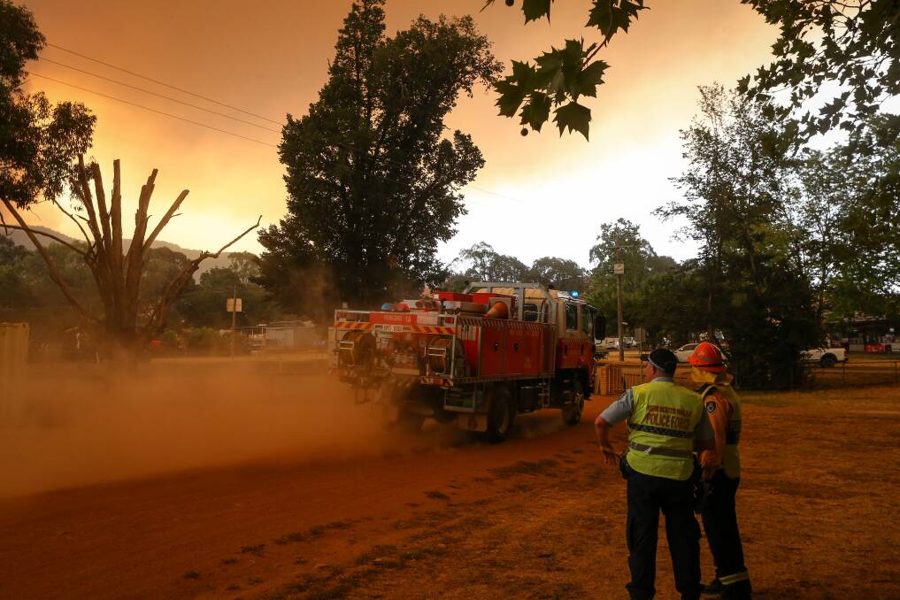 HARD WORK: The RFS has downgraded the Green Valley fire.