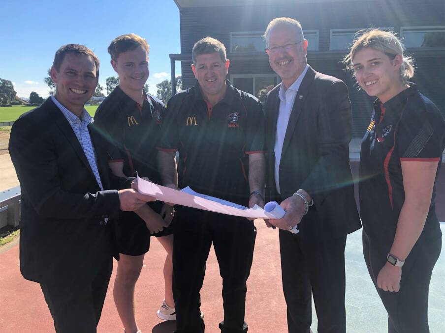 UPGRADES: Liberal candidate for Indi Steve Martin and Nationals candidate Mark Byatt with Wodonga Raiders' Hayden Clarke, Stephen Hudson and Amy Hudson. 