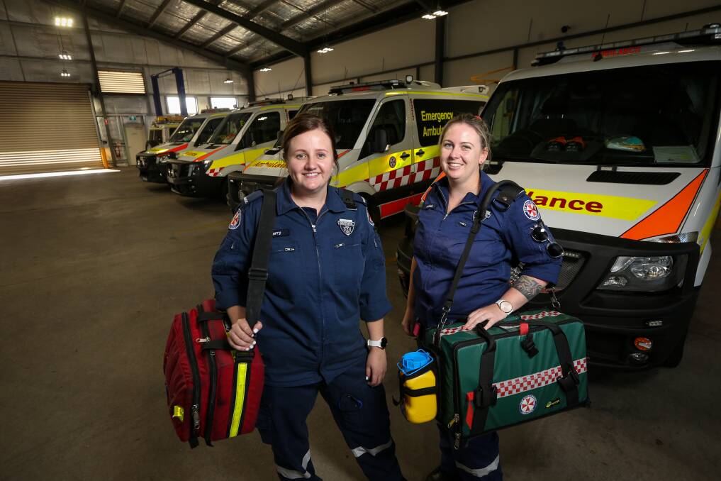 FRONT LINE: Albury paramedics Larissa Schausinger and Hannah Wilson will now ask four questions before entering any home in NSW. Picture: JAMES WILTSHIRE