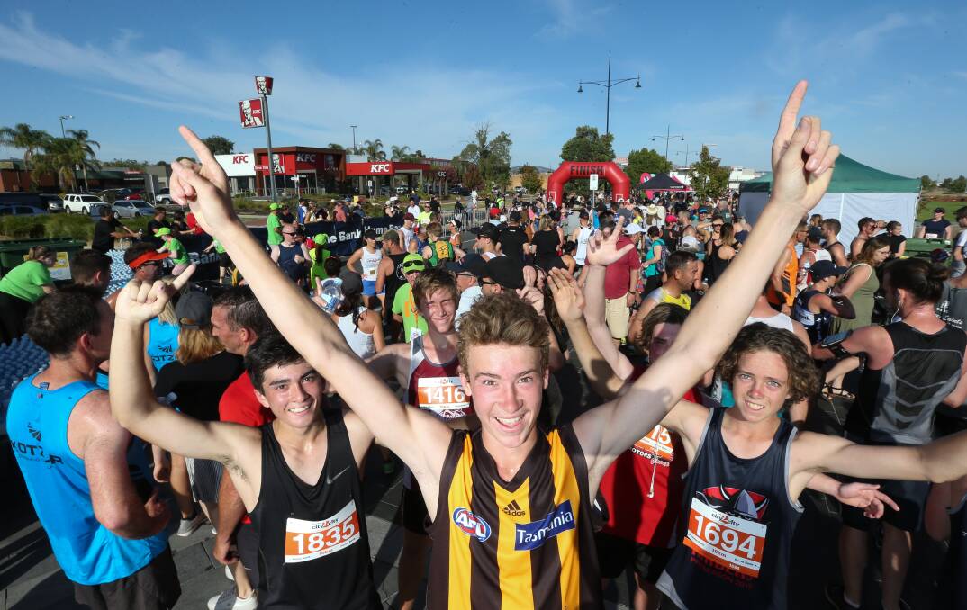 FINISH LINE: Ryan O'Connell, 16, Alex Pocock, 16 and Jake Lawson, 17 celebrate at the finish line of the 2019 event. Picture: KYLIE ESLER
