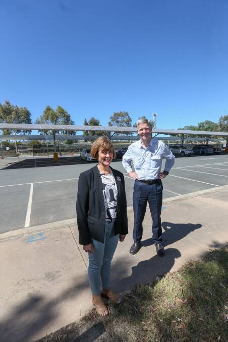 MORE PANELS: La Trobe Pro-Vice Chancellor Guin Threlkeld with WATCH president Lauriston Muirhead who welcomed the added solar panels at the Wodonga campus. Picture: TARA TREWHELLA