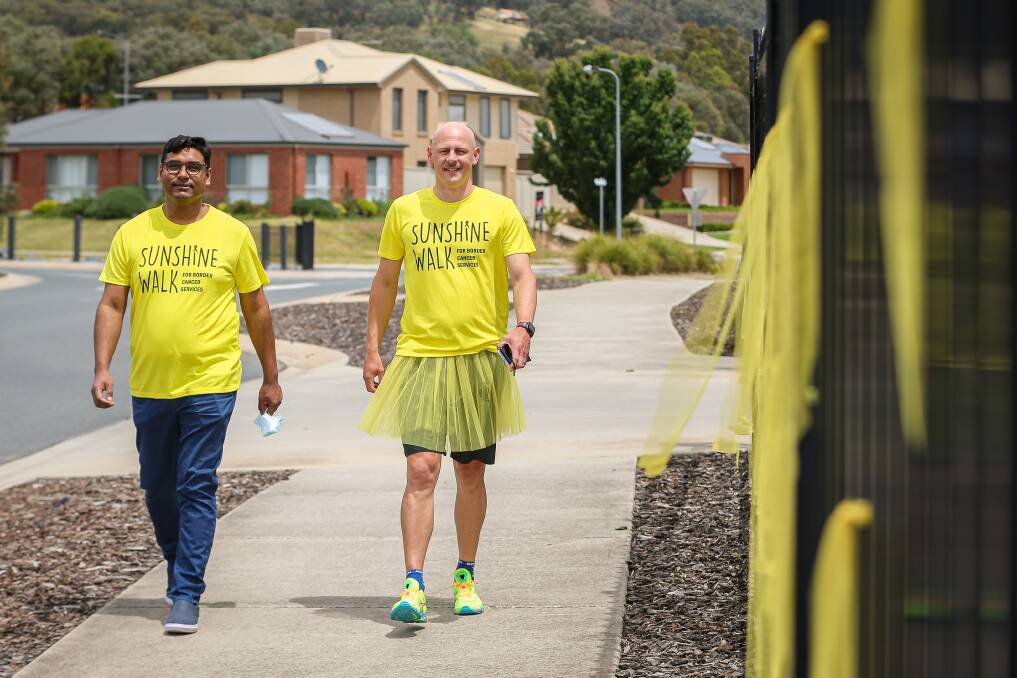 WALK: Daintree Medical Centre skin cancer GP Dr Chinmoy Datta and Umbrella Health chief executive Michael Cochrane. Picture: JAMES WILTSHIRE.