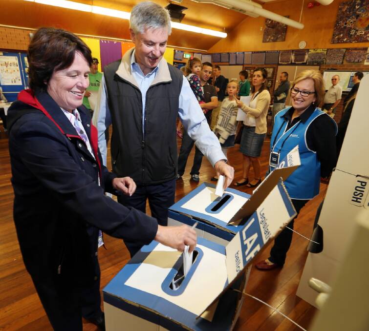Member for Albury Greg Aplin and his wife Jill casting their votes at the Thurgoona Public School booth earlier this year. Picture: JOHN RUSSELL