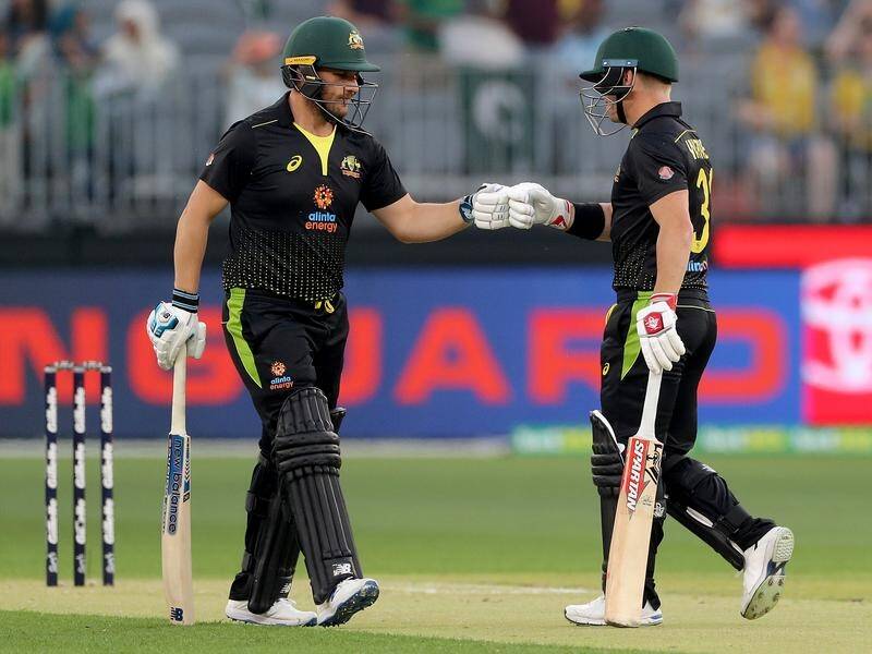 Aaron Finch (L) and David Warner (R) have blasted Australia to a 10-wicket T20 win over Pakistan.
