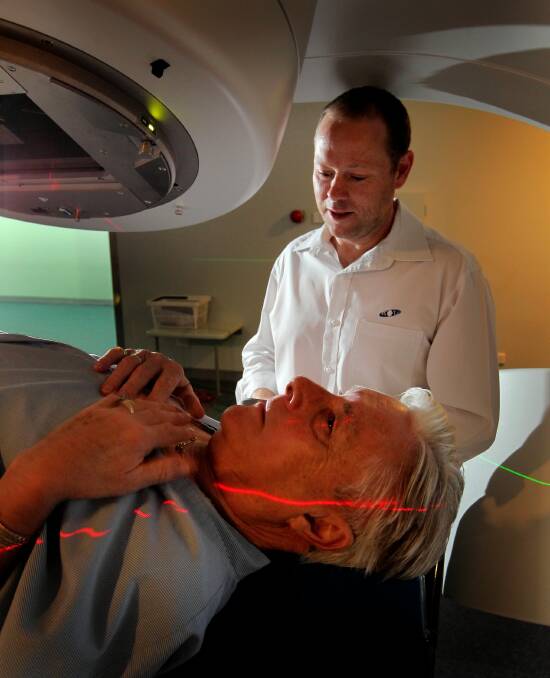 Radiation therapist Nick Bowles treats patient James Haseloff from Yarrawonga. Picture: DAVID THORPE
