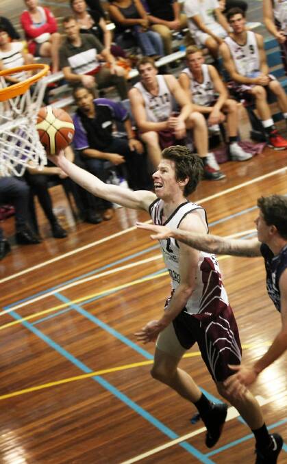 Bushrangers’ guard Aaron Fry reaches for the basket in the loss to Casey. Picture: DYLAN ROBINSON