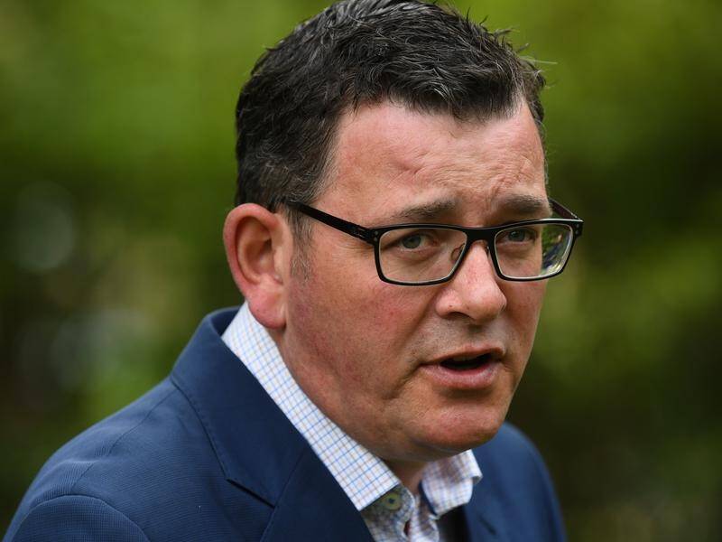 "We're extremely happy to see the last red zone in NSW be downgraded," Premier Daniel Andrews says.