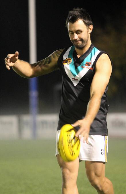 Former Des Kennedy medallist Rory Muggivan works on his skills at Hume league training.