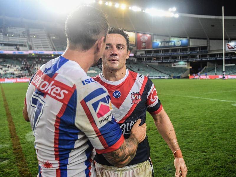Cooper Cronk (r) wants Mitchell Pearce to know his offer of advice still stands.