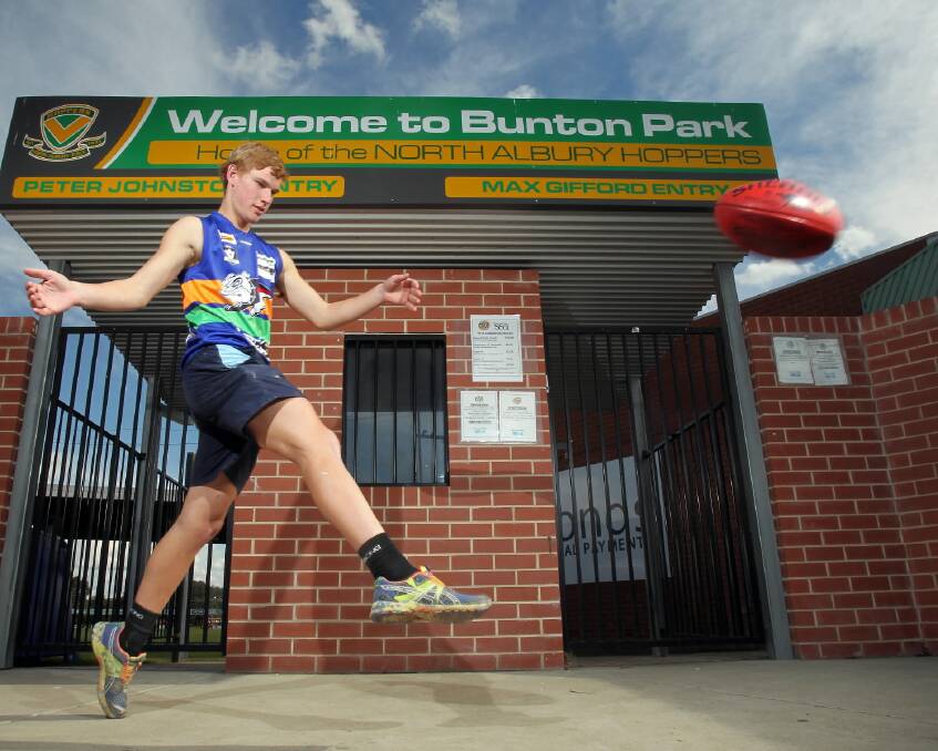 Thurgoona’s Luke Gerecke, 16, gets in some practice and takes the Bulldogs’ charity guernsey for a test drive ahead of tomorrow’s Good Friday clash against Dederang-Mount Beauty at Bunton Park. Picture: KYLIE ESLER
