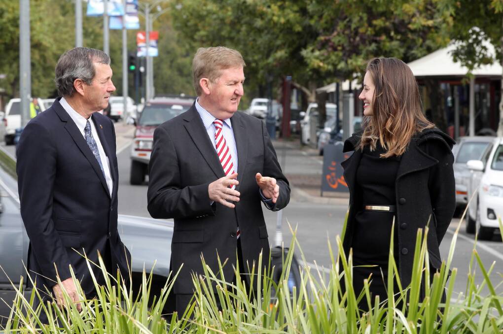 Retiring MP Bill Sykes and Peter Ryan with the Nationals candidate for Euroa Stephanie Ryan. Picture: KYLIE ESLER