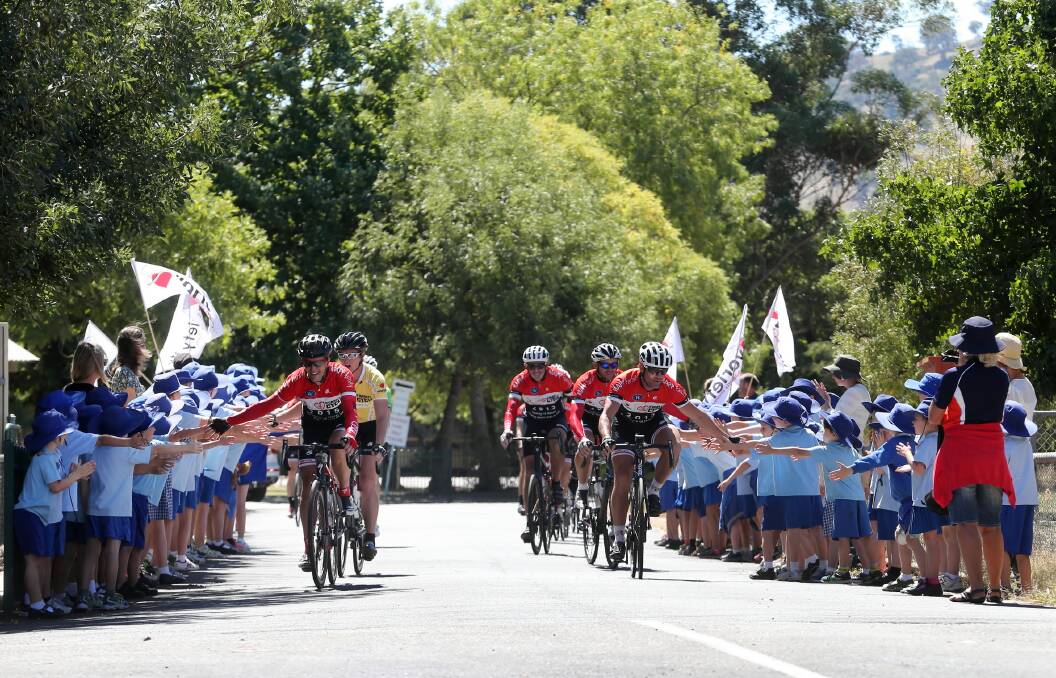 The Variety Cycle ride received a warm welcome at Kiewa Valley Primary School when it came through Tangambalanga on its way from Corryong to Wangaratta. Picture: JOHN RUSSELL