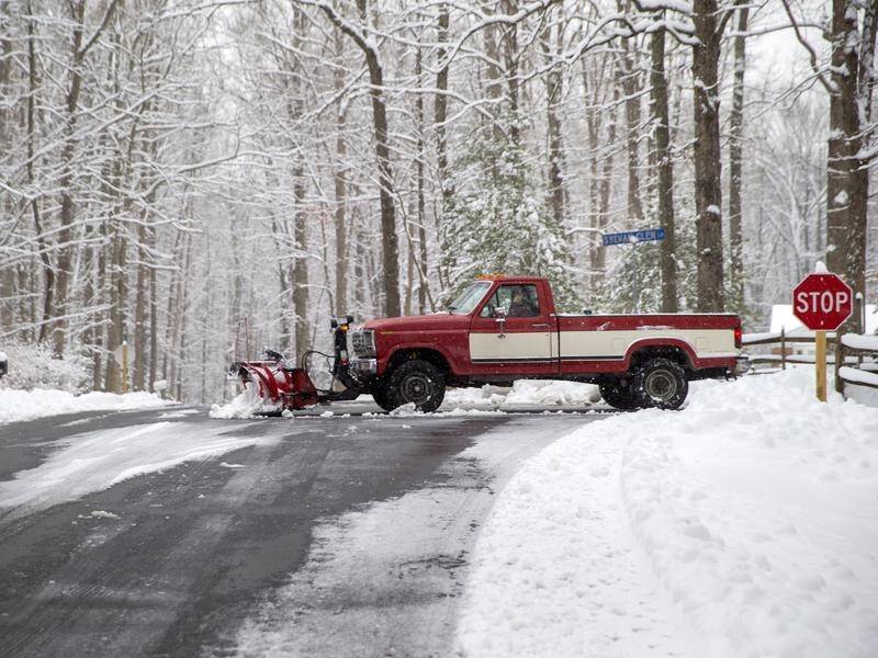 A US winter storm has contributed to hundreds of car accidents, power outages and cancelled flights.