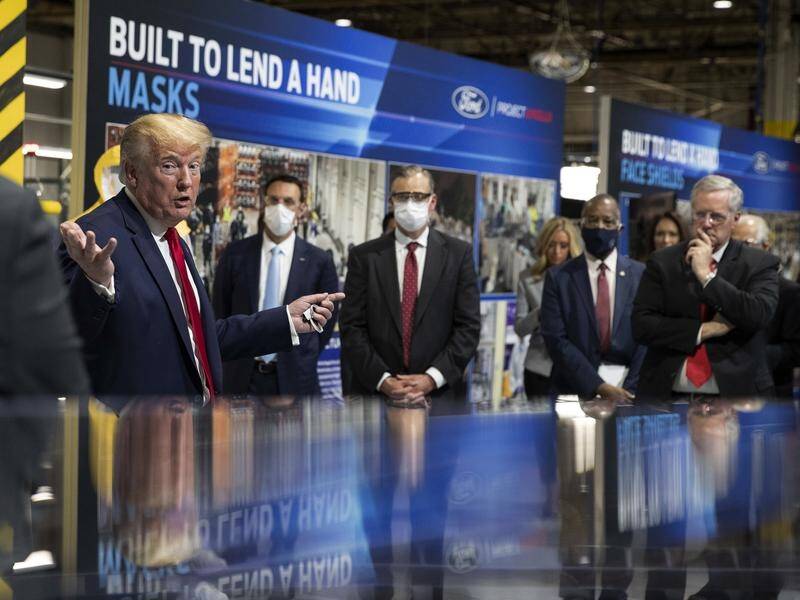 President Donald Trump opted not to wear in a mask in front of the cameras at a Ford car plant.