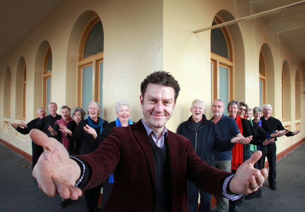 Sydney choral conductor Brett Weymark with members of the Murray Conservatorium Choir who will be performing this weekend as part of The Sound of Light. Picture: KYLIE ESLER