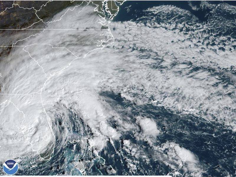Hurricane Nicole has made landfall on Florida's east coast, weakening to become a tropical storm. (AP PHOTO)